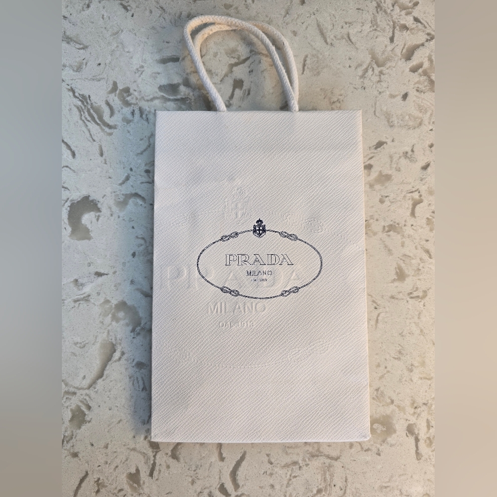 Prada White Textured Shopping Bag. 6.5" Wide x 10.5" Tall x 3.25" Deep